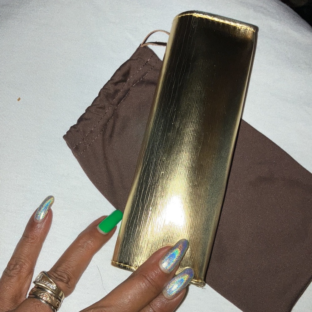 FREE Tory Burch glass case. With $69+ purchase